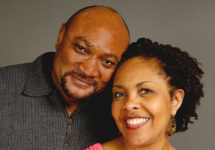 Photo of a man and woman smiling for a picture. Link to Life Stage Gift Planner Ages 45-65 Situations.